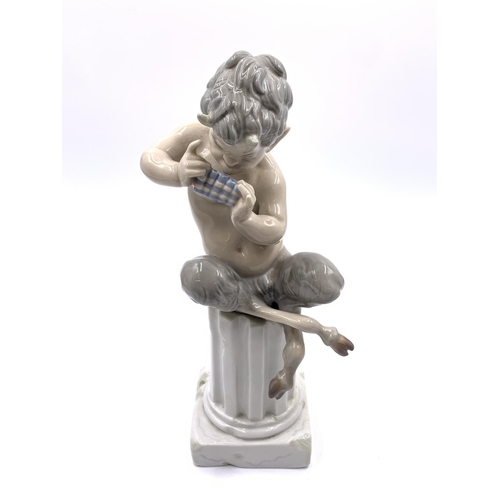 327 - A Lladro Satyr porcelain figurine - approx. 27cm high