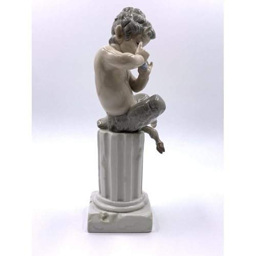 327 - A Lladro Satyr porcelain figurine - approx. 27cm high