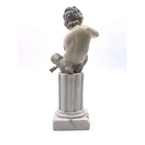 327 - A Lladro Satyr porcelain figurine - approx. 27cm high