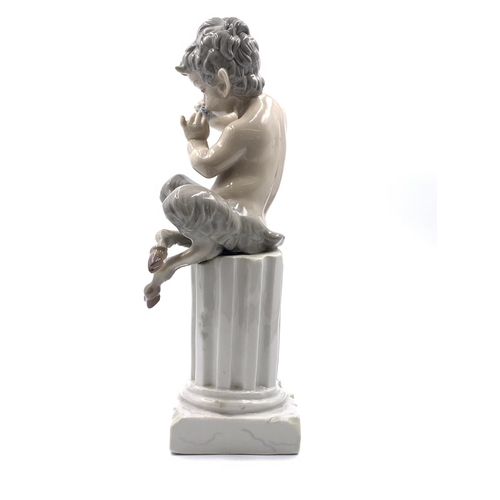 327 - A Lladro Satyr porcelain figurine - approx. 27cm high