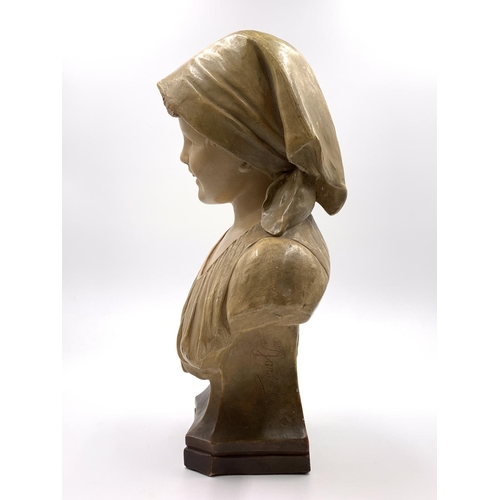 335 - A late 19th/early 20th century Goldscheider hand painted terracotta bust of a young girl, numbered 2... 