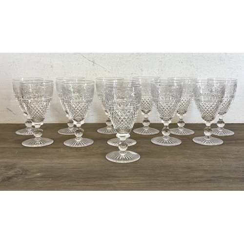 342 - Twelve Stuart Beaconsfield cut crystal sherry/port glasses - approx. 13cm high