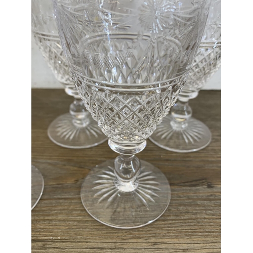 342 - Twelve Stuart Beaconsfield cut crystal sherry/port glasses - approx. 13cm high