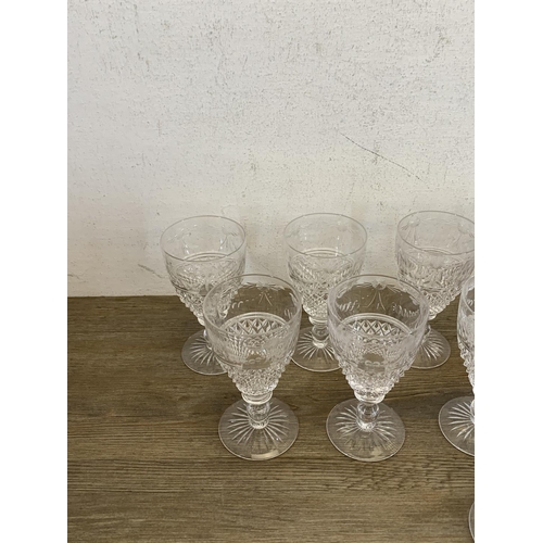 342 - Twelve Stuart Beaconsfield cut crystal sherry/port glasses - approx. 13cm high