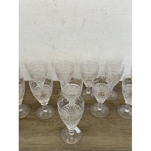 342 - Twelve Stuart Beaconsfield cut crystal sherry/port glasses - approx. 13cm high