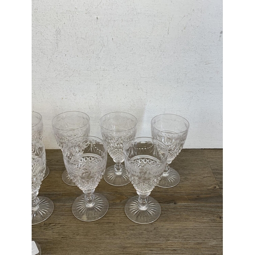 342 - Twelve Stuart Beaconsfield cut crystal sherry/port glasses - approx. 13cm high