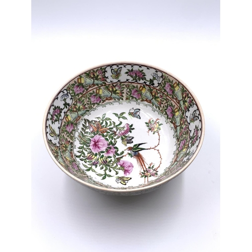 349 - A Chinese Canton Famille Rose hand painted porcelain circular footed bowl - approx. 11.5cm high x 25... 