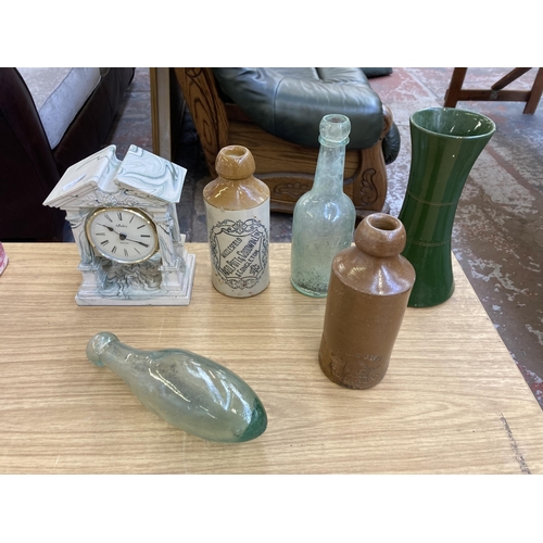 369 - A collection of ceramics and glassware to include G. M. Ltd Covent Garden vase, Beswick Lion figurin... 