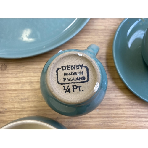 371 - A collection of Denby Manor Green stoneware dinnerware