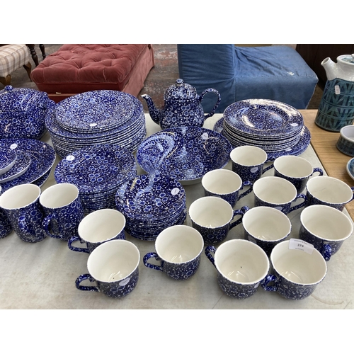 374 - A collection of Calico pattern dinnerware