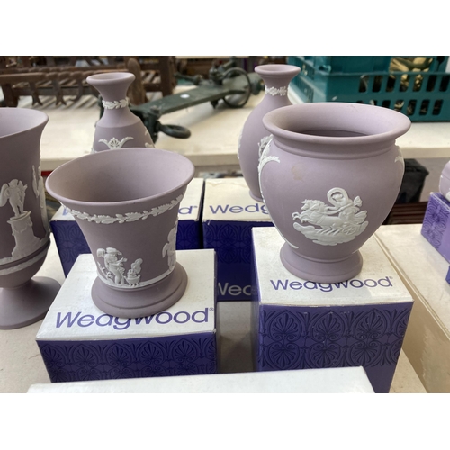 380 - Nine Wedgwood lilac Jasperware vases