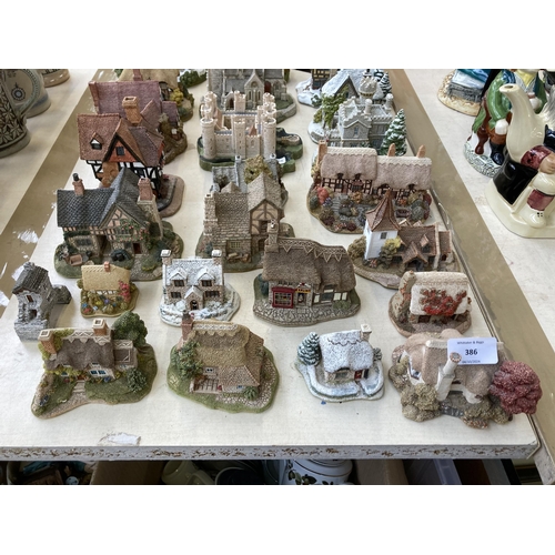 386 - Twenty four Lilliput Lane handmade resin sculptures to include Ann Hathaway 1989, Yuletide Inn, Snow... 