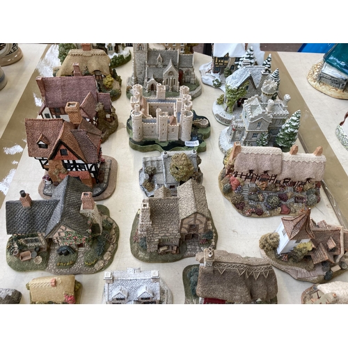 386 - Twenty four Lilliput Lane handmade resin sculptures to include Ann Hathaway 1989, Yuletide Inn, Snow... 