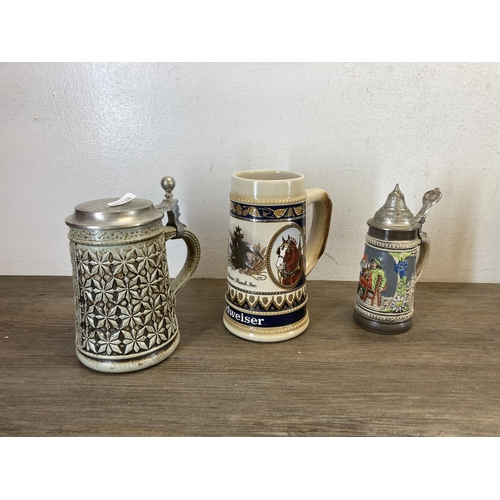 387 - Eight German ceramic Steins