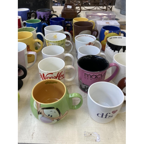 388 - A collection of ceramic mugs to include Cadburys chocolate, Numatic Henry, The Simpsons, Wallace & G... 