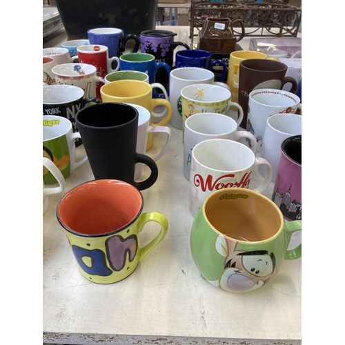 388 - A collection of ceramic mugs to include Cadburys chocolate, Numatic Henry, The Simpsons, Wallace & G... 