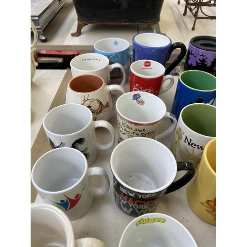 388 - A collection of ceramic mugs to include Cadburys chocolate, Numatic Henry, The Simpsons, Wallace & G... 