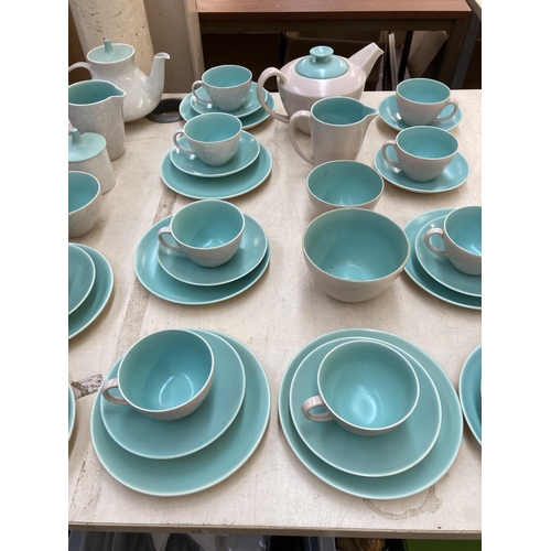 394 - A collection of Poole Pottery Twintone dinnerware