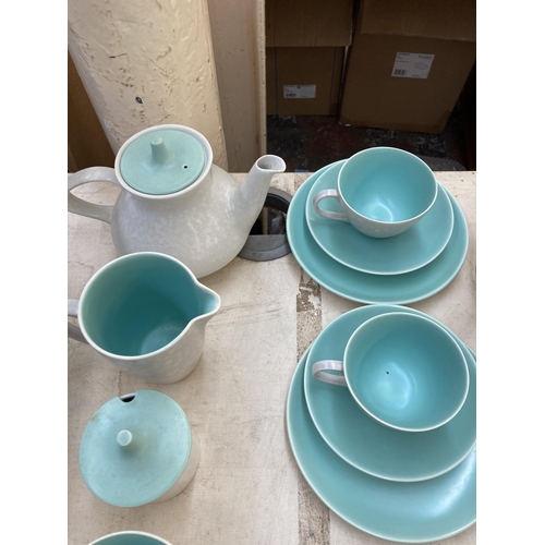 394 - A collection of Poole Pottery Twintone dinnerware