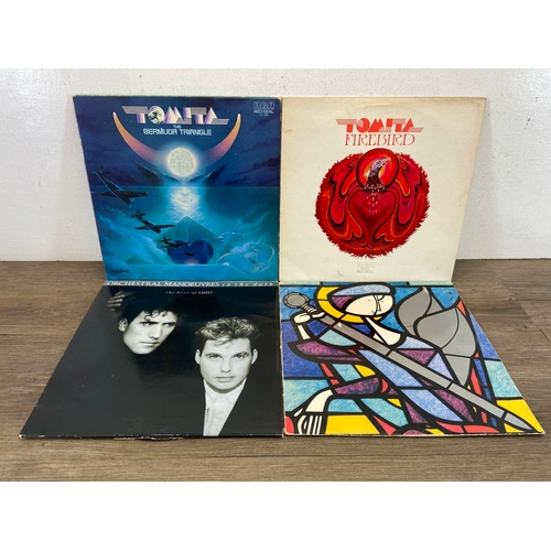 710 - Fifteen LP vinyl records by a variety of artists and bands to include OMD, Peter Gabriel, Alabama, L... 