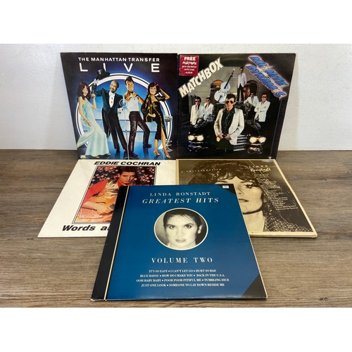 710 - Fifteen LP vinyl records by a variety of artists and bands to include OMD, Peter Gabriel, Alabama, L... 