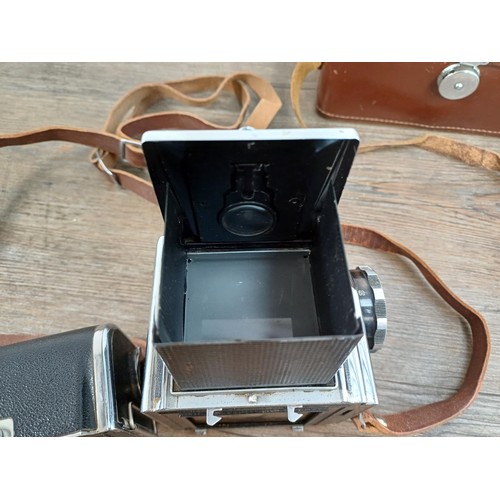 594 - A cased 1970s Arsenal Zenith 80 6x6 medium format SLR camera for 120 film with spare film back - mad... 