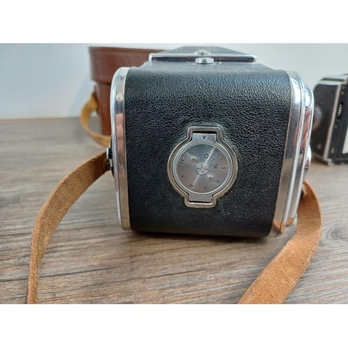 594 - A cased 1970s Arsenal Zenith 80 6x6 medium format SLR camera for 120 film with spare film back - mad... 