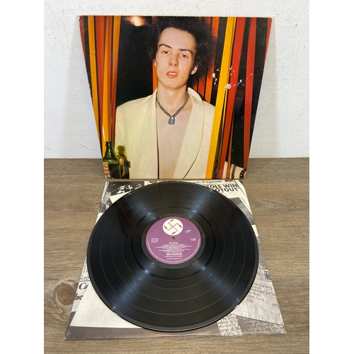 715 - Four LP vinyl records, Sid Vicious 'Sid Sings' (V 2144), David Bowie 'Stage' double LP (PL 02913), Q... 