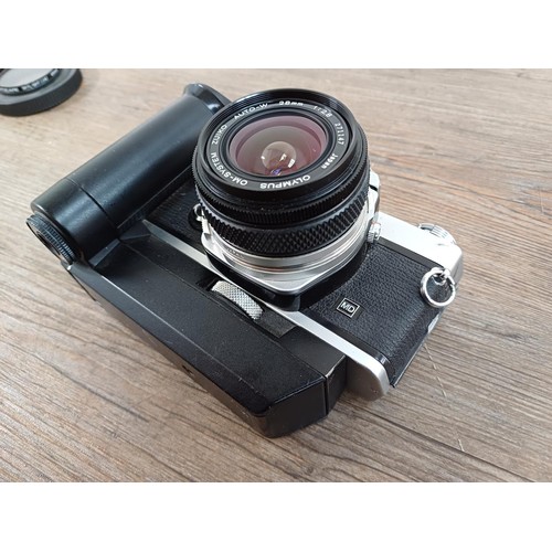 601 - An Olympus OM-1N MD 35mm SLR camera fitted with Zuiko Auto-W 1:2.8 f=28mm lens and Winder 2