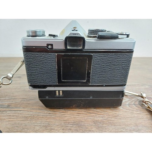 602 - Two Olympus OM-2N MD 35mm SLR cameras, one fitted with Zuiko Auto-S 1:1.8 50mm lens and Winder 2 and... 