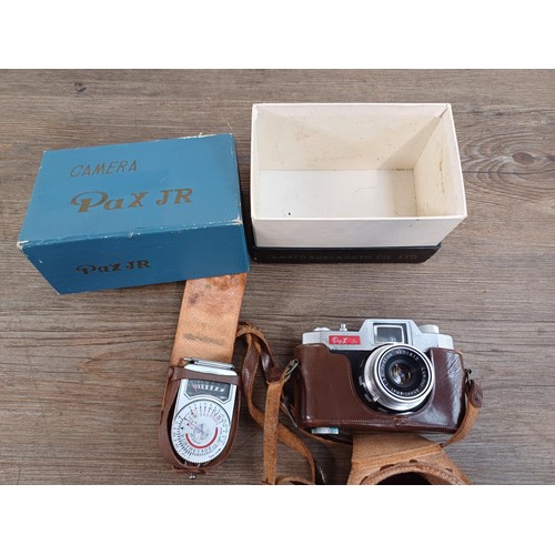 604 - Thirteen boxed cameras to include Ricoh R1 ultra-slim autofocus compact 35mm with instruction manual... 