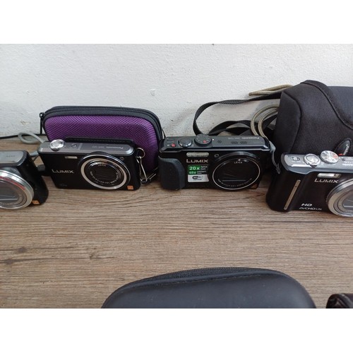 605 - A collection of Panasonic Lumix compact digital cameras to include TZ40, TZ3, TZ30, FX35 10mp, TZ4, ... 