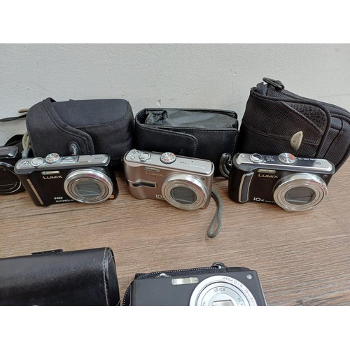 605 - A collection of Panasonic Lumix compact digital cameras to include TZ40, TZ3, TZ30, FX35 10mp, TZ4, ... 