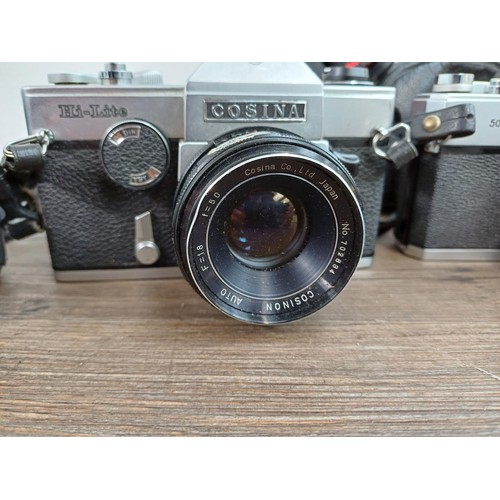 610 - Six Japanese 35mm SLR cameras, Fujica STX1, Konica Autoreflex TC fitted with F1.8 40mm lens, Cosina ... 