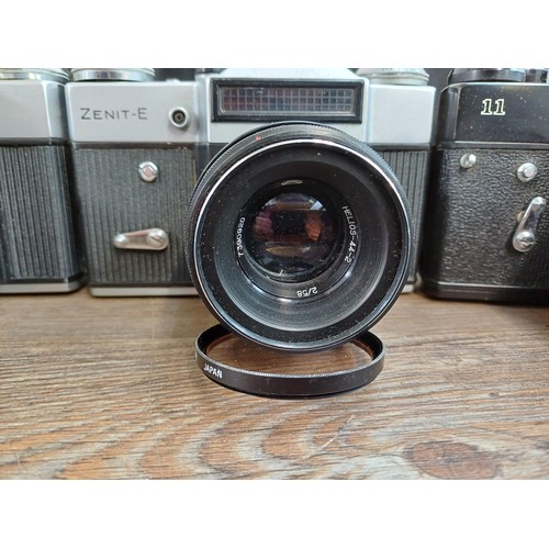 612 - Six KMZ Zenit 35mm SLR cameras, three 11 fitted with Helios-44M-4 2/58 lenses and three E fitted wit... 