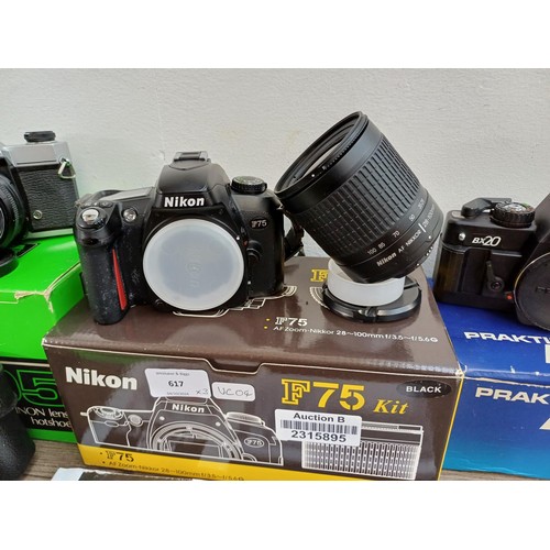 617 - Three boxed 35mm SLR cameras, one cased Fujica ST605 fitted with Fujinon 1:2.2 f=55mm lens with inst... 