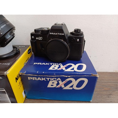 617 - Three boxed 35mm SLR cameras, one cased Fujica ST605 fitted with Fujinon 1:2.2 f=55mm lens with inst... 