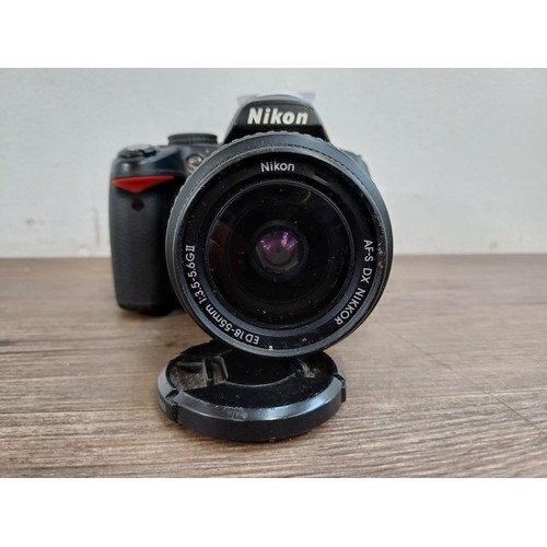 649 - A Nikon D3000 DSLR camera fitted with Nikkor AF-S DX ED 18-55mm 1:3.5-5.6G II lens