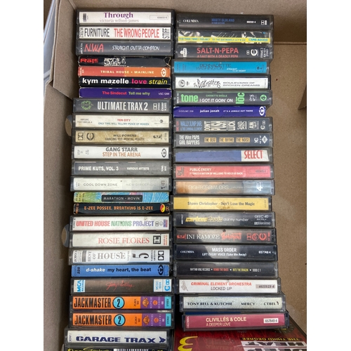 739 - Two Boxes containing CDs and cassettes by a variety of artists and bands to include Oasis, R.E.M, Bo... 