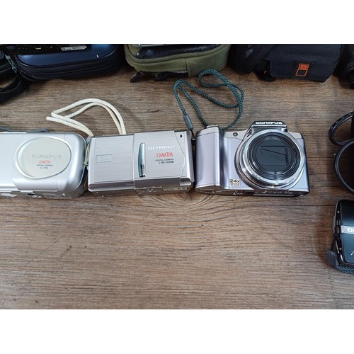 657 - A collection of Olympus compact digital cameras to include µ[mju:] 700 all-weather 7.1mp, µ[mju:] 30... 