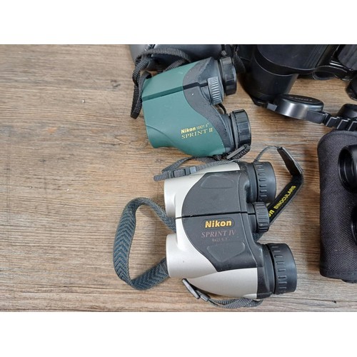 659 - Seven pairs of Nikon binoculars to include Action 8x40, Aculon A30 10x25, Eagleview 8-24x25 zoom, Tr... 