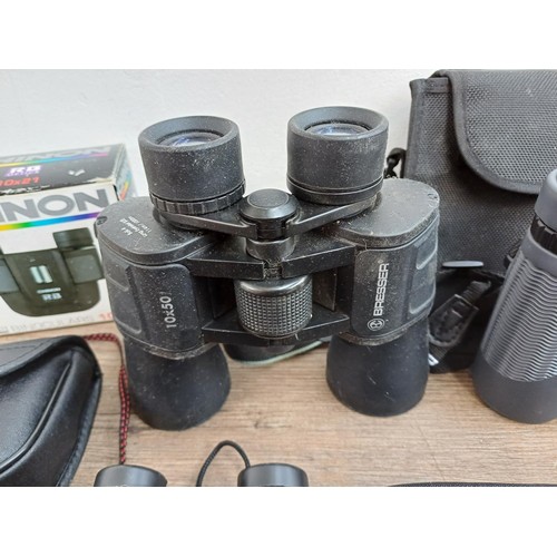 660 - Six pairs of binoculars, Bushnell 10x42 waterproof, Minolta Compact 10x25, Bresser 10x50, Pentax 8x2... 