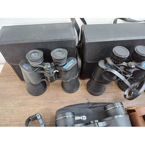 661 - A collection of binoculars to include Pentasonic, Commodore 10x50, Chinon 7-15x35 zoom, Dollond Luma... 