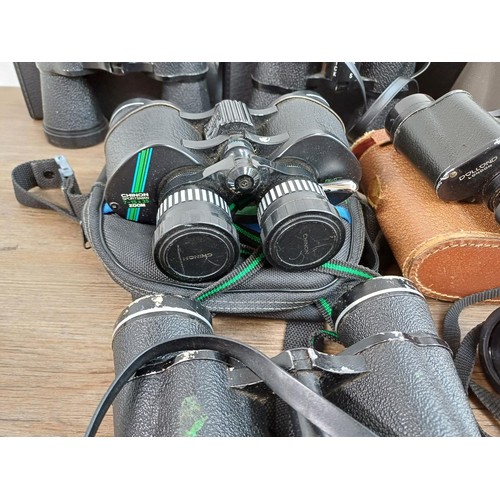 661 - A collection of binoculars to include Pentasonic, Commodore 10x50, Chinon 7-15x35 zoom, Dollond Luma... 