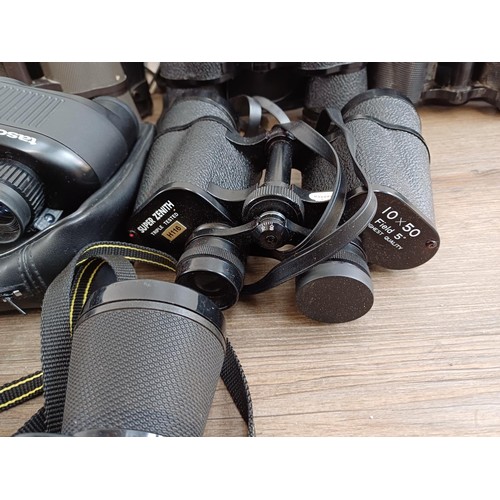 661 - A collection of binoculars to include Pentasonic, Commodore 10x50, Chinon 7-15x35 zoom, Dollond Luma... 