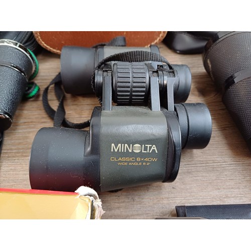 661 - A collection of binoculars to include Pentasonic, Commodore 10x50, Chinon 7-15x35 zoom, Dollond Luma... 