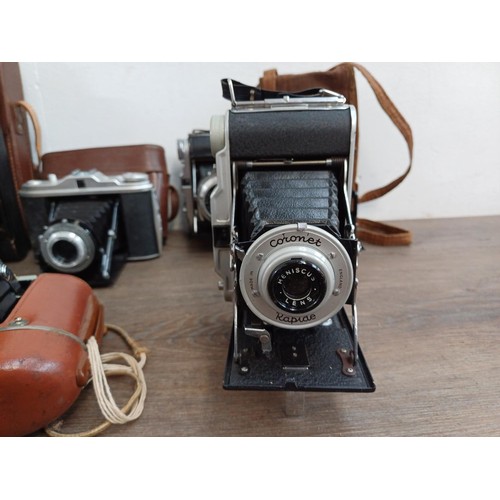 664 - Eleven folding cameras to include Zeiss Ikon Nettar 518/16, Coronet Rapide, Balda Baldix, Agfa Isole... 