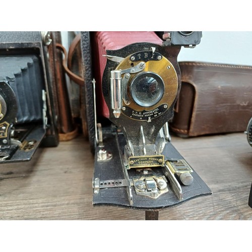 666 - Eight folding cameras to include Voigtländer Bessa I 6x9 viewfinder for 120 film, Agfa Isolette V, K... 