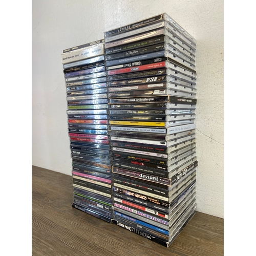 740 - Seventy-five CDs by a variety of rock artists and bands to include Incubus, Cream, Nirvana, 30 Secon... 