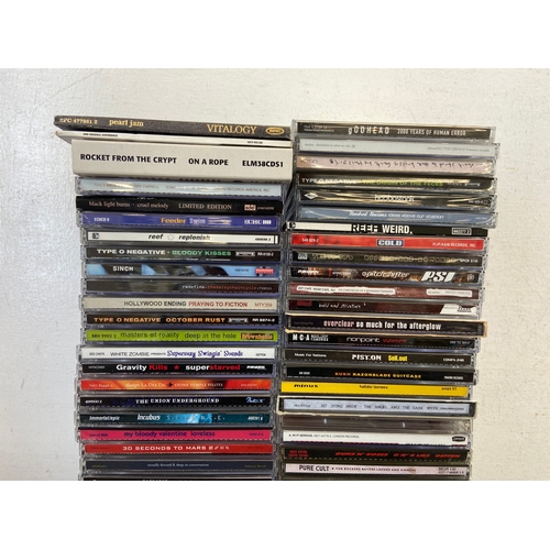 740 - Seventy-five CDs by a variety of rock artists and bands to include Incubus, Cream, Nirvana, 30 Secon... 